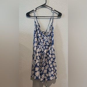 Blue romper with white flowers